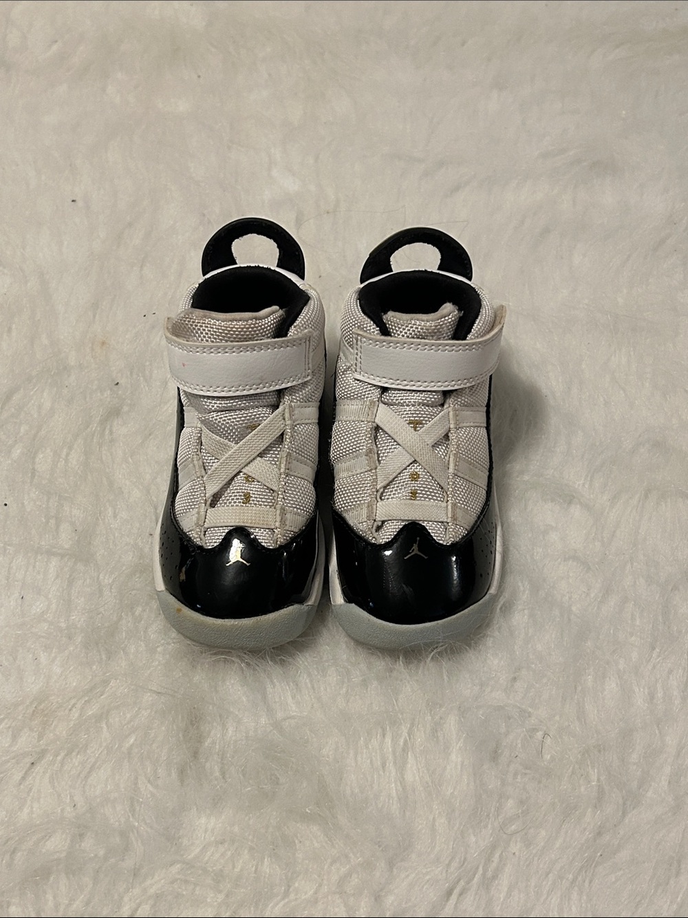 Toddler Jordan’s White and Black with Velcro straps